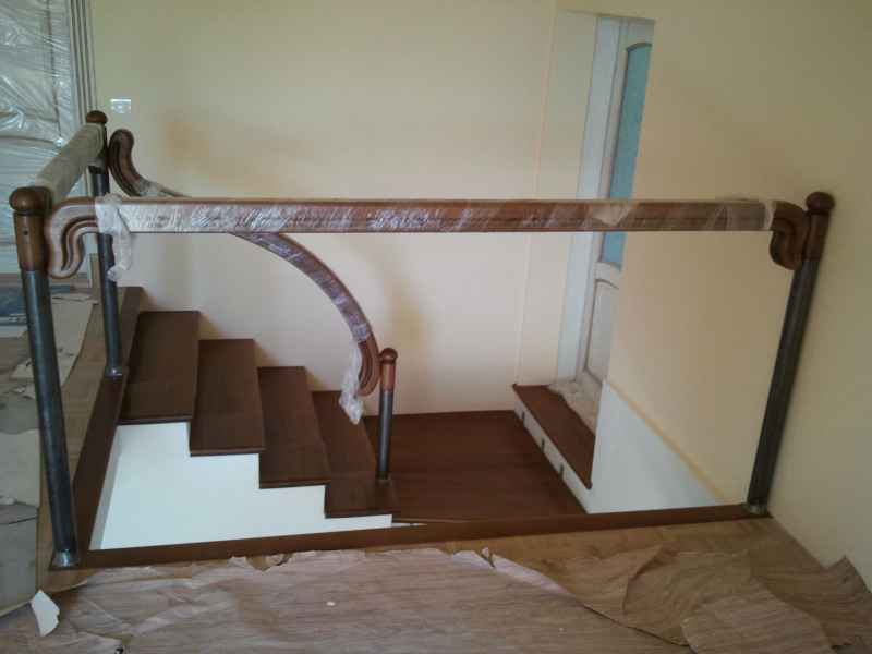 Отделка бетонного каркаса деревом, подготовка под ковку, а не на оборот - сначала ковка